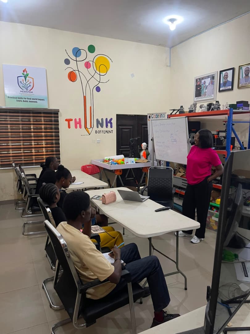 Peace teaching a TVET class at Meristem