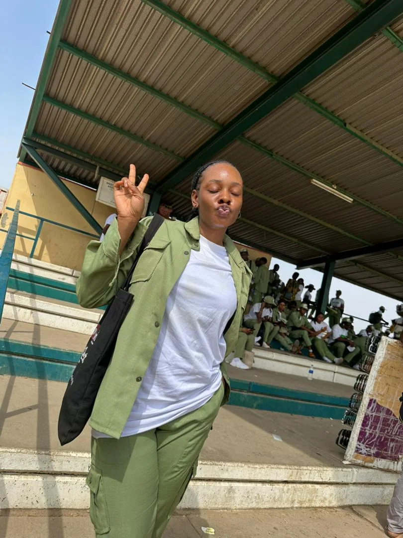 Peace in her NYSC uniform at camp