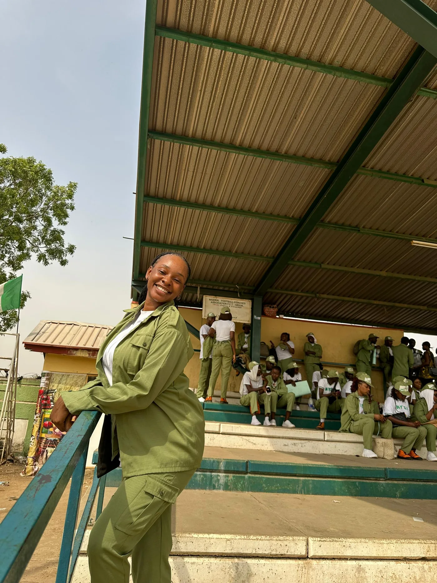 Peace in her NYSC uniform at camp